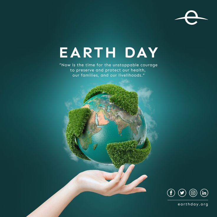 the earth day poster is being held by someone's hand with grass on it