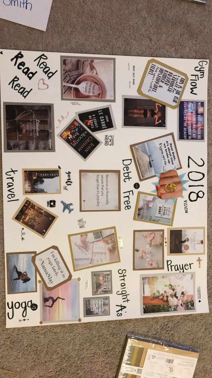 a bulletin board covered in pictures and other items on the floor next to a pile of papers