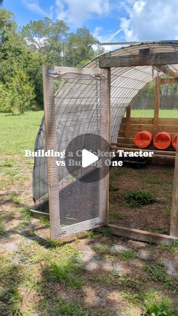 a small wooden structure with red buckets in it and the words building a chicken tractor