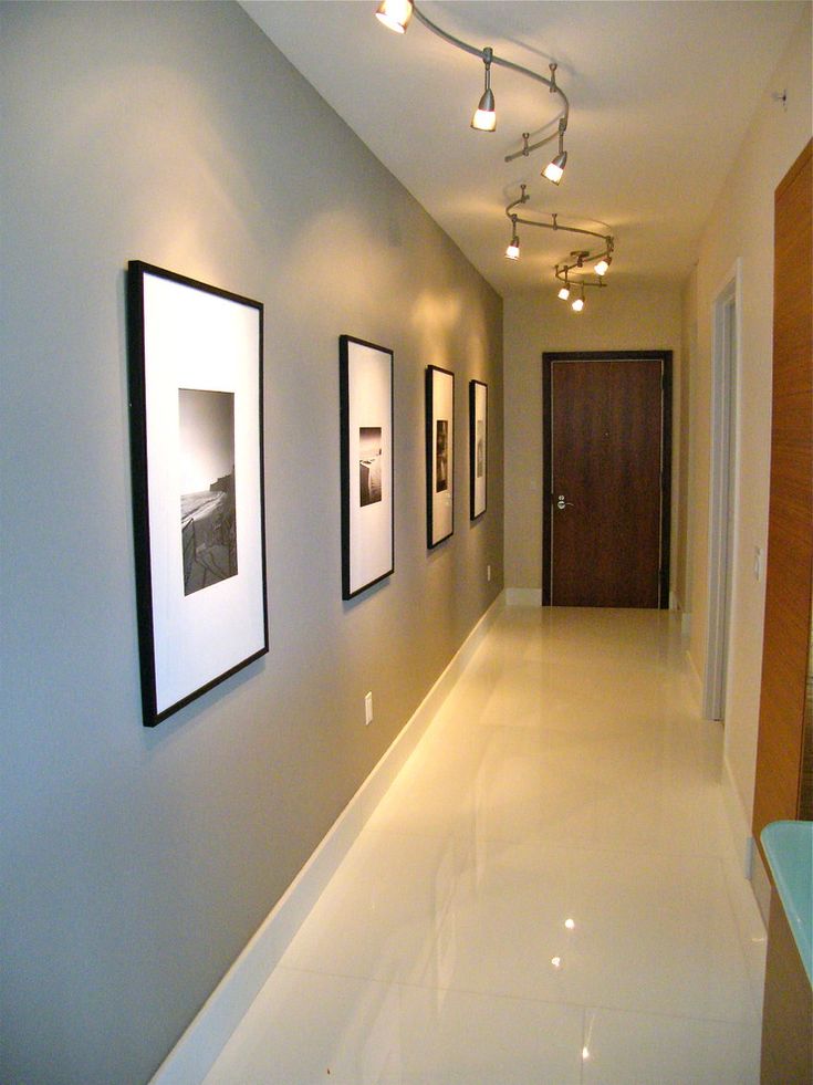 the hallway is clean and ready to be used for art work or as an office space