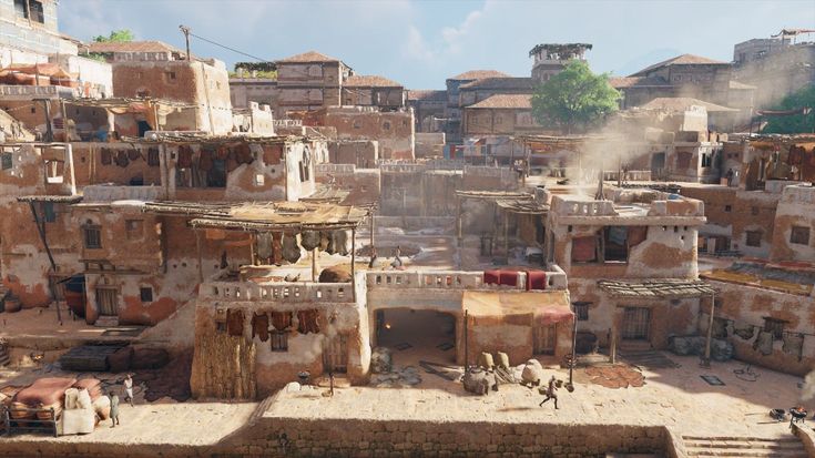 an aerial view of a village in the desert