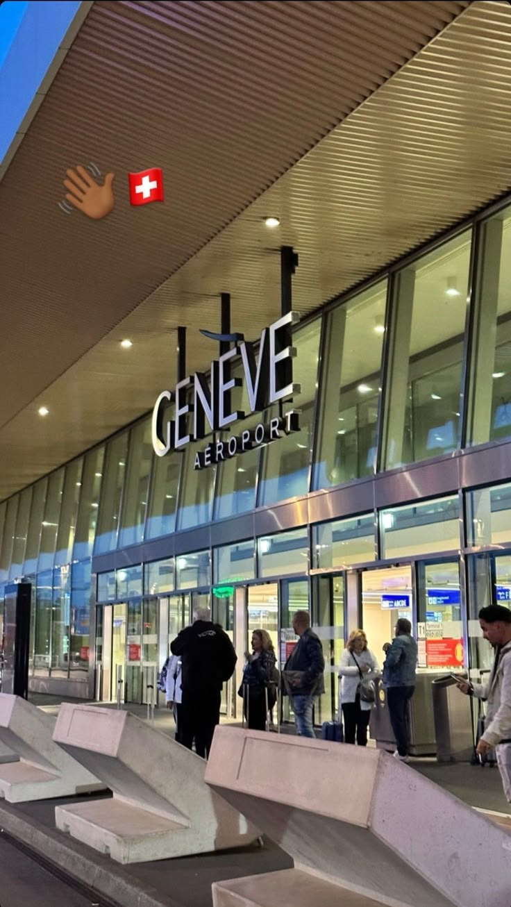 people are walking around in front of a building with a sign that says geneva airport