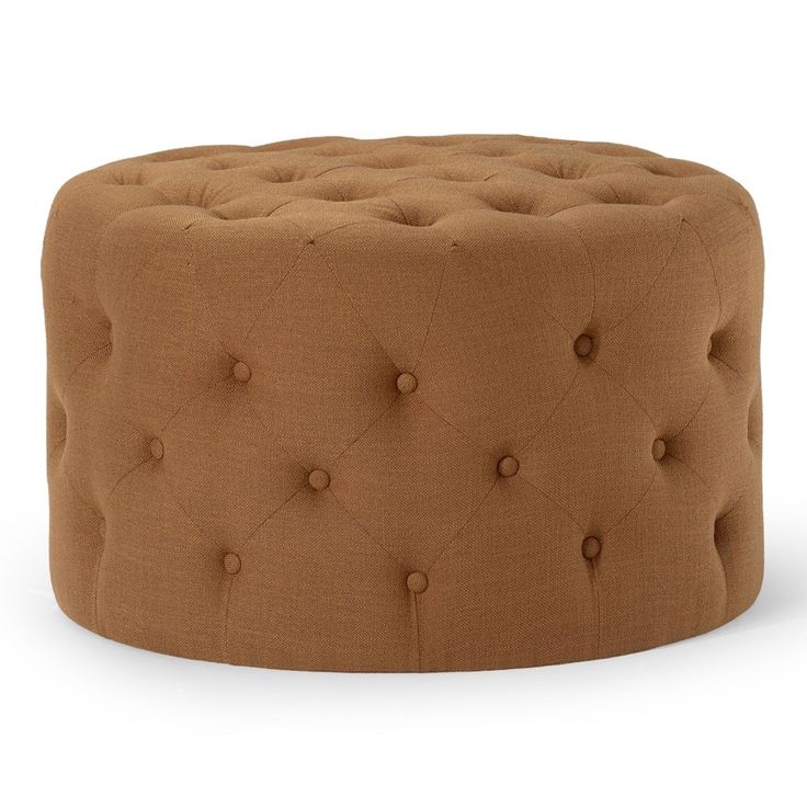 a round ottoman with buttons on the front and back legs, in brown fabric upholstered