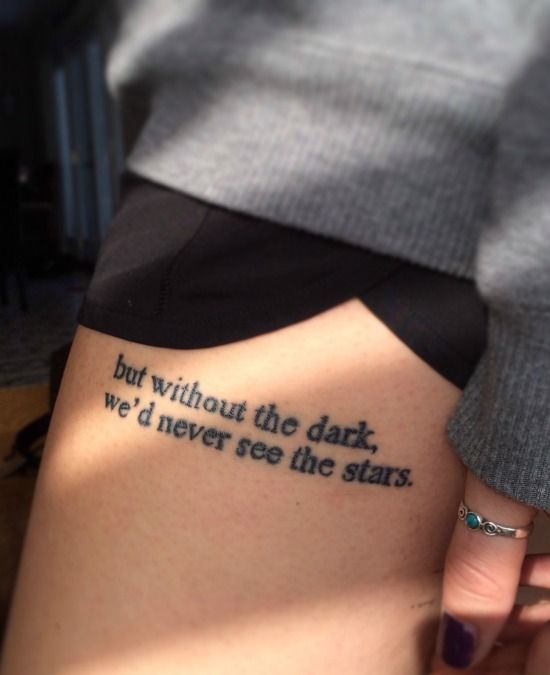 a woman's leg with a tattoo saying, but without the dark we're never see the stars