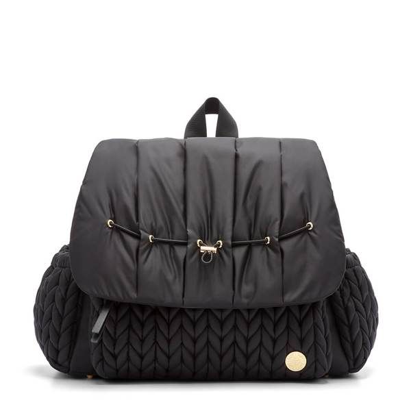 a black quilted backpack with gold hardwares