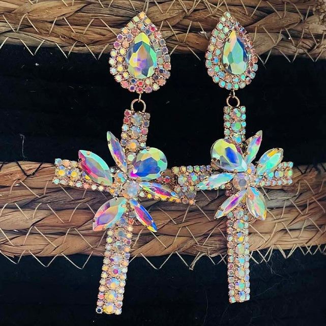 JESUS IS THE REASON FOR THE SEASON! We are loving our iridescent earrings! These gold plated cross dangle earrings are large & in charge! They are light in weight & perfect for the holidays! LENGTH: 3.5 " 1.4 OZ Cross Shaped Rhinestone Jewelry For Parties, Crystal Cross Pendant Jewelry With Rhinestones, Cross-shaped Rhinestone Jewelry For Parties, White Cross-shaped Jewelry With Rhinestones, Cross-shaped Rhinestone Jewelry Gift, Angel Wing Earrings, Beaded Earrings Native, Jewelry Post, We Are Love