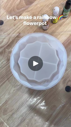 a video demonstrating how to make a rainbow flowerpot