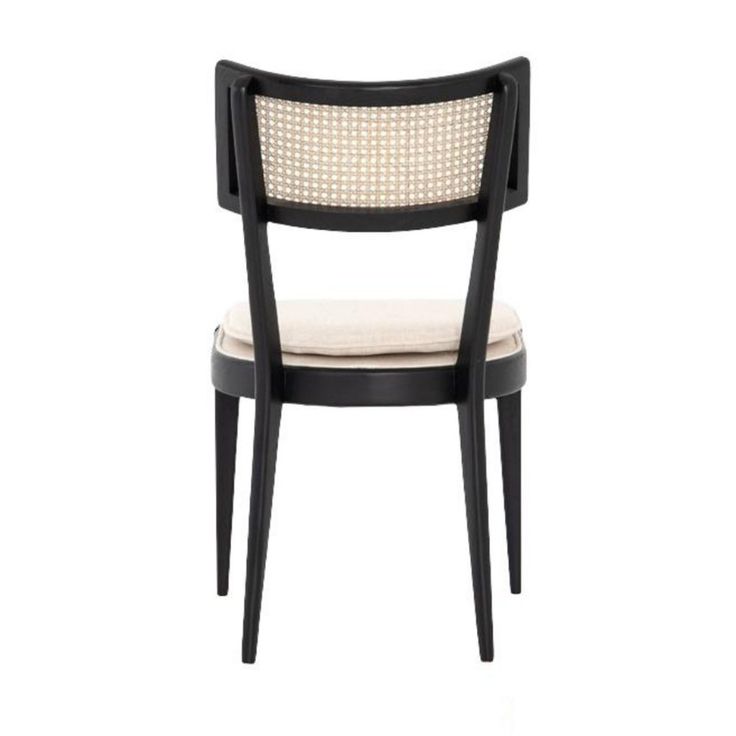 a black and white chair with a cushion on top of it's back end