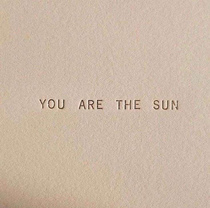 an old typewriter with the words you are the sun printed on it's paper