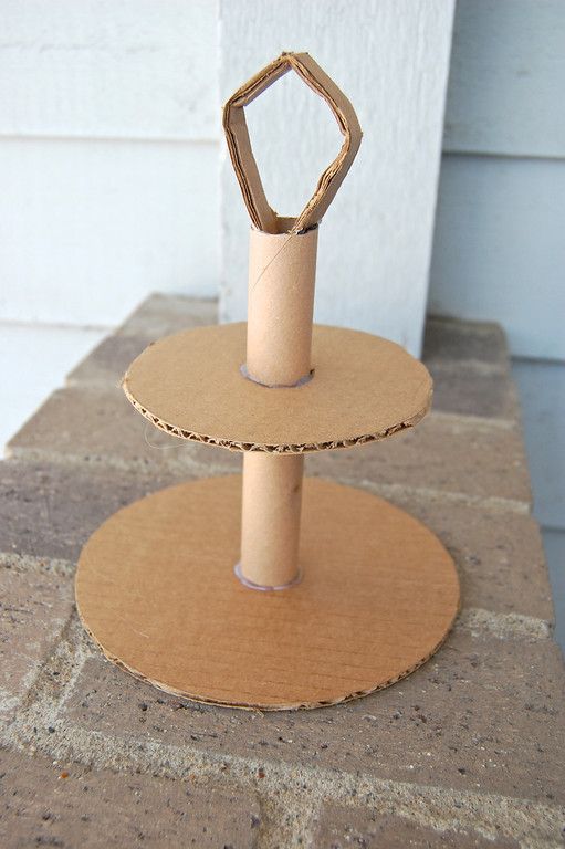 three tiered cake stand made out of cardboard