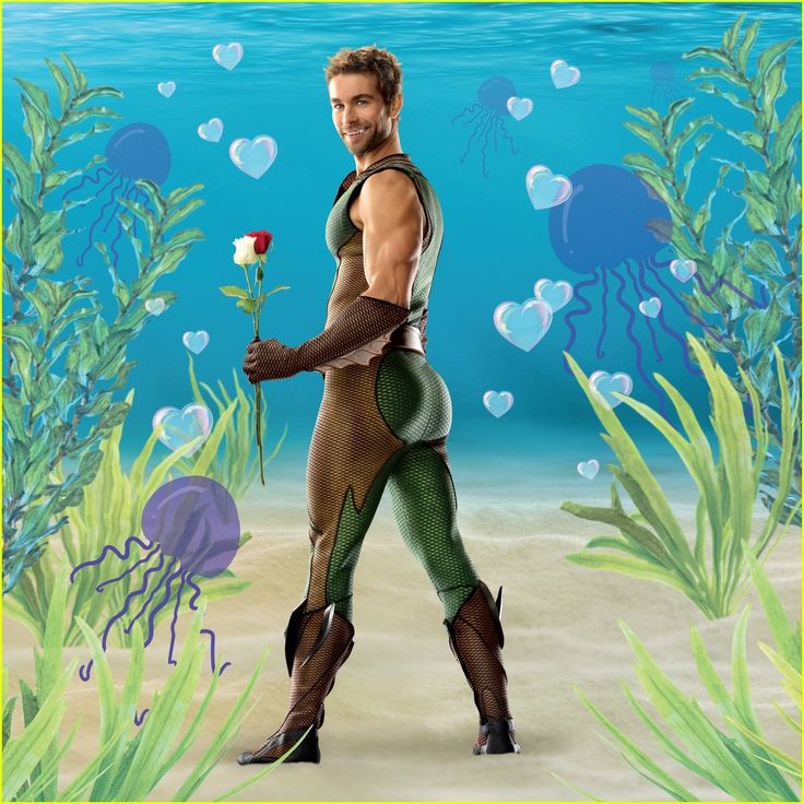 a man in an underwater scene holding a rose