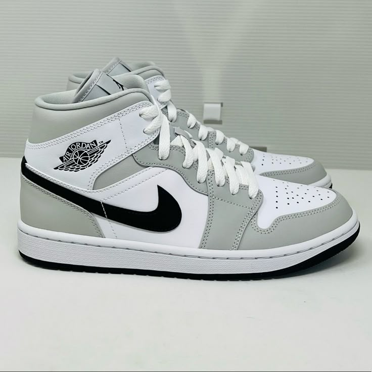 Nike Air Jordan Women’s Air Jordan 1 Mid Grey Fog/Black- White Basketball And Fashion Sneakers. This Is What Everyone Wears To Clubs Or On The Basketball Court!!! Most Trendiest Item To Own!! Women’s: Us 8.5; Uk 6; Br 38; 25.5cm; Eur 40 Women’s Us 8.5; Is Converted Into Youth And Men’s Sizing Men’s Us 7 Youth Unisex Us 7 These Sneakers Are Very Very Hard To Find And Sold On Stock X And Goat For Much Much More. Brand New With Box!!! Silver Air Jordan 1, Nike Shoes High Tops Jordans, Shoes Nike High Tops, Trendy Back To School Shoes, Cute Shoes For Middle School, Cute Jordans For Women, Cute Back To School Shoes, Mens Air Jordans