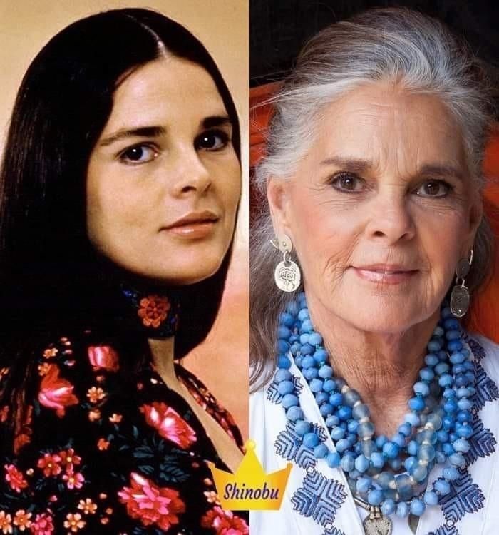 an older woman with gray hair and blue necklaces next to another woman with grey hair