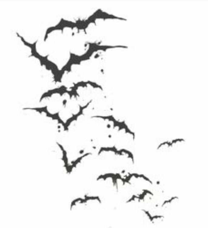 a flock of bats flying through the air