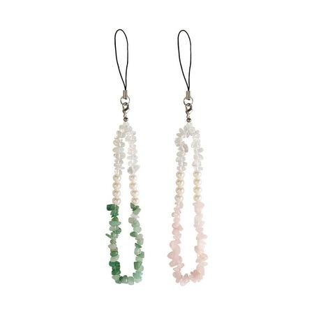 two long beaded earrings with green and white beads on the ends, hanging from hooks