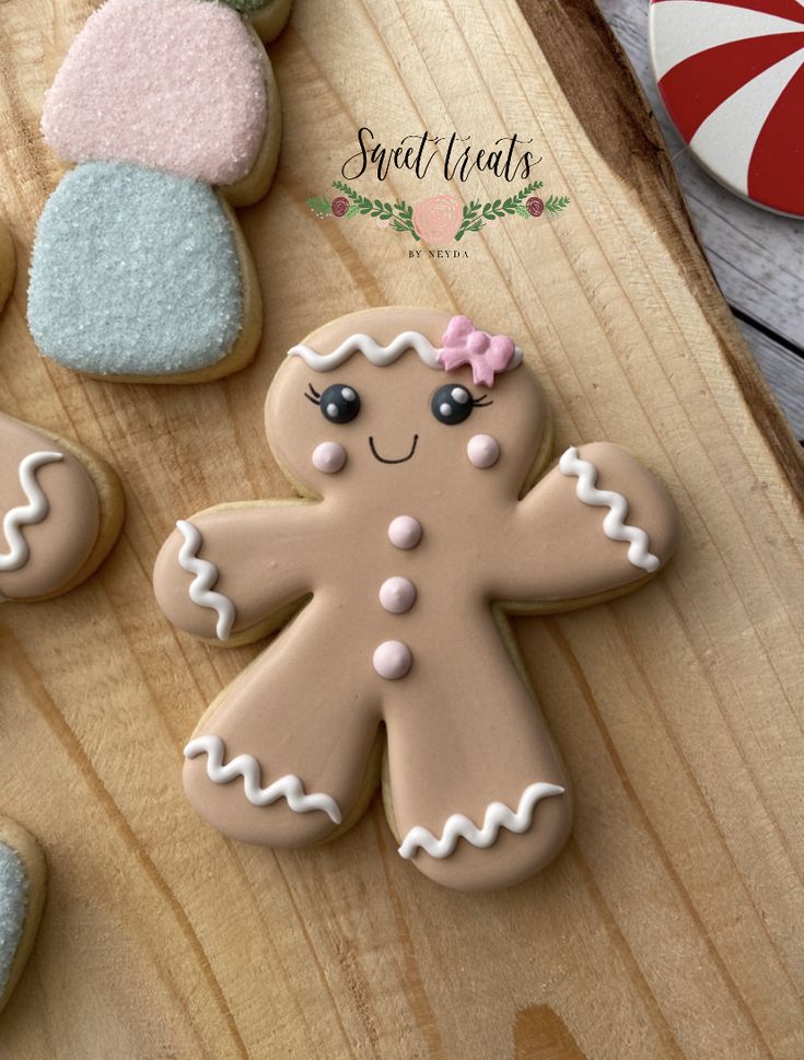 a close up of a cookie on a wooden surface with candy and cookies in the background