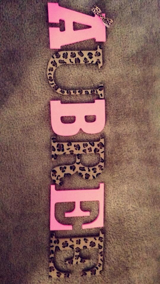 leopard print and pink letters that spell out the word daddy