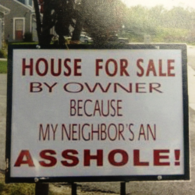 a sign that says house for sale by owner because my neighbor's an ashhole