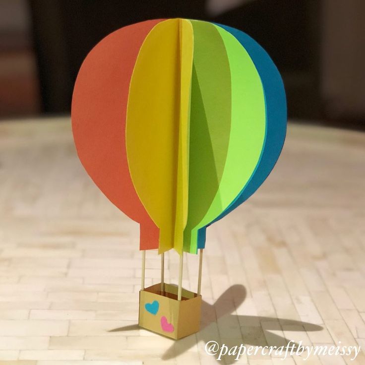 an origami hot air balloon on a table