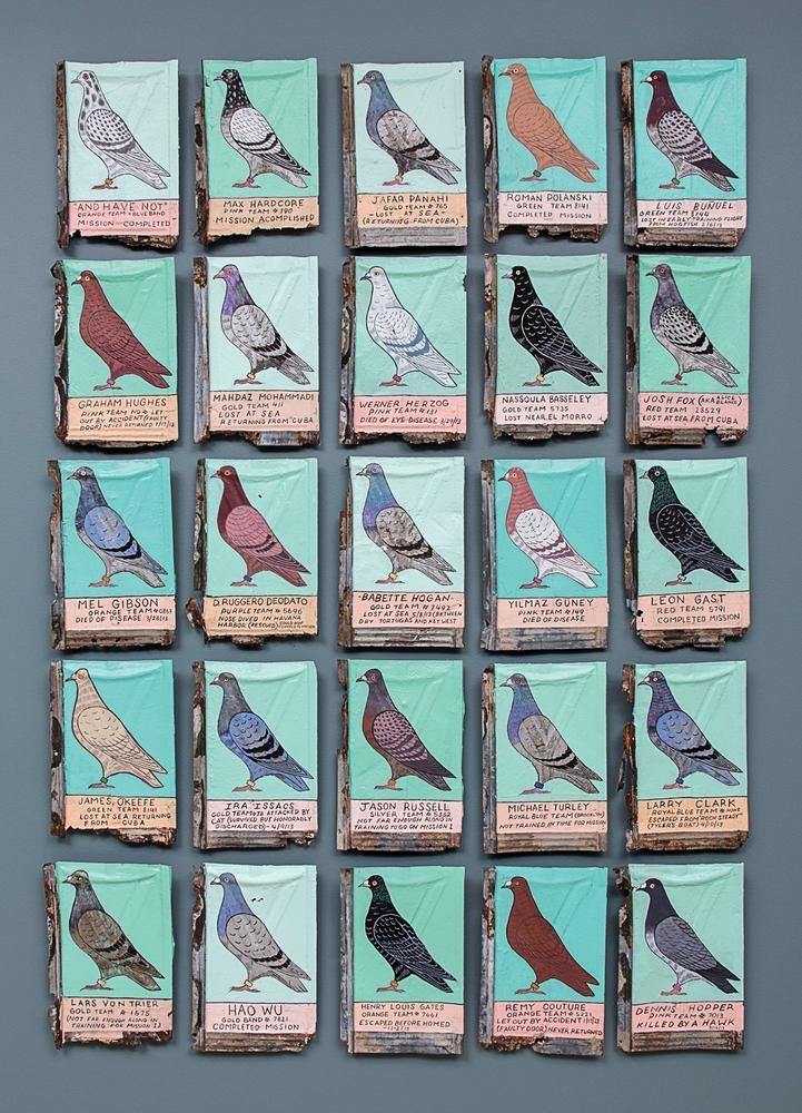 several birds are displayed on small pieces of paper