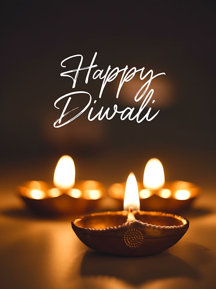 happy diwali greeting card with lit candles