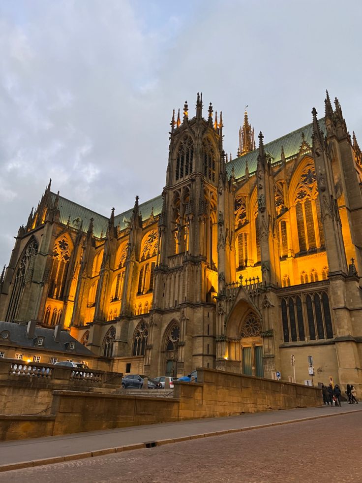 an old cathedral lit up at night