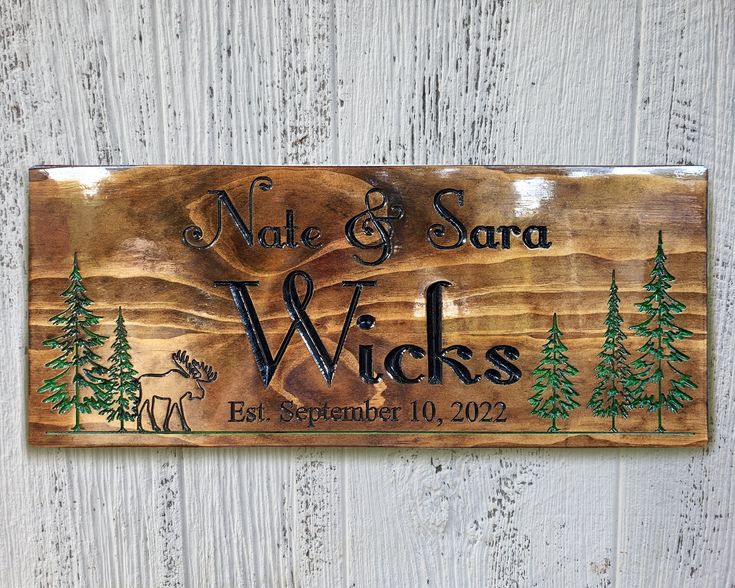 a wooden sign that says, name and sara wicks