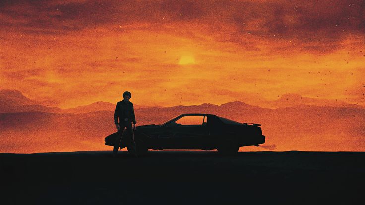 a man standing next to a car in front of an orange and black sky with clouds