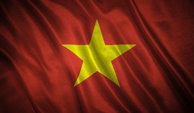 the national flag of vietnam is depicted in this close - up photo, with silky folds