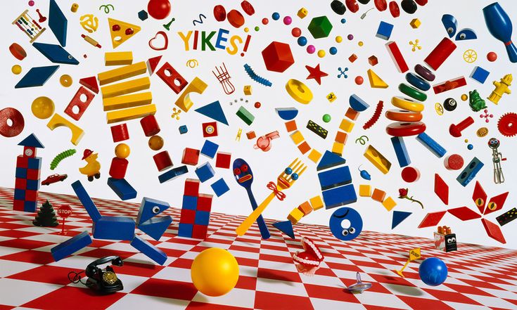 an image of colorful objects floating in the air on a checkerboard pattern floor