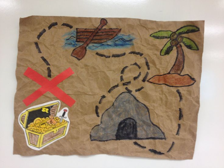 a piece of brown paper with drawings on it and a sticker next to it