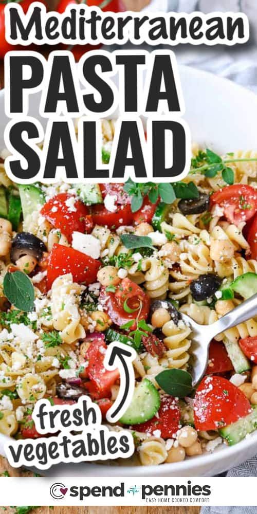 pasta salad with fresh vegetables and feta cheese