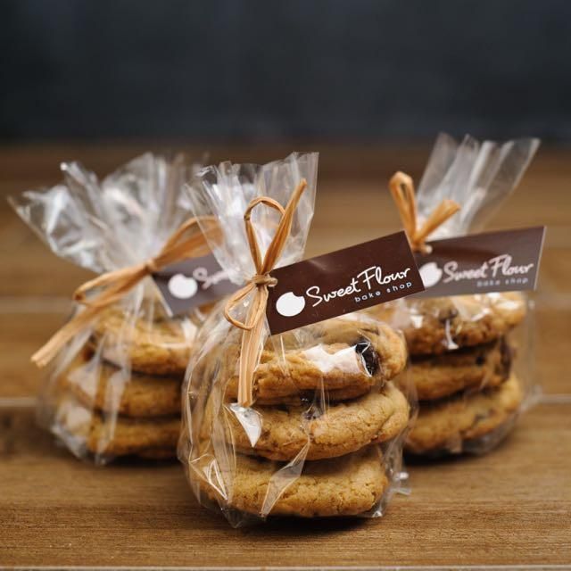 cookies wrapped in plastic and tied with brown ribbon