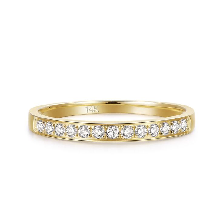 a yellow gold wedding band with white diamonds