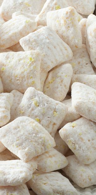 a pile of white dog treats sitting on top of a table