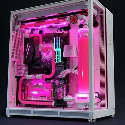 the inside of a computer case is lit up with pink lights and fanless parts