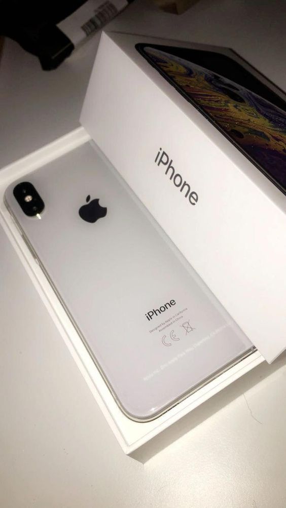 an apple iphone in its box on a table