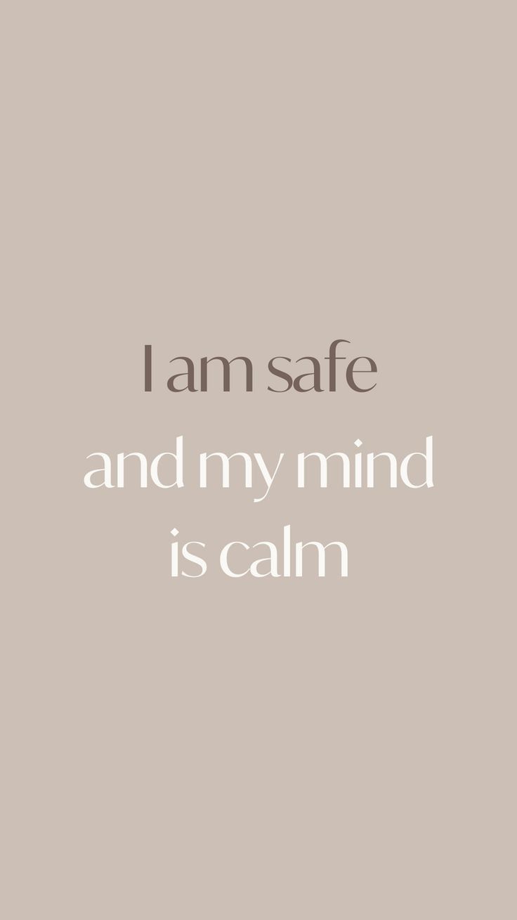 the words i am safe and my mind is calm on a gray background with white lettering