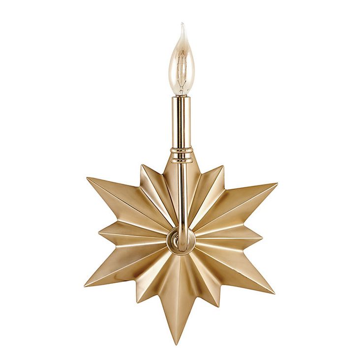 a gold star light hanging from the ceiling on a white background with clippings