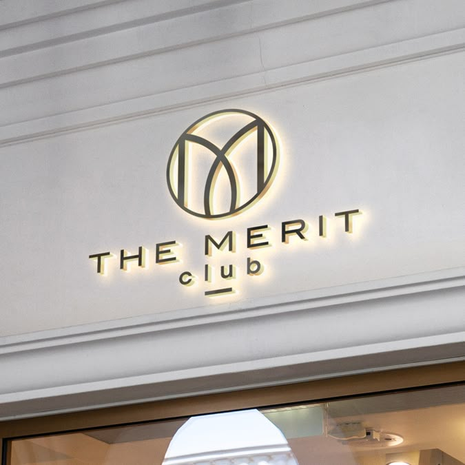 the merit club sign is lit up above the entrance to the restaurant's front door