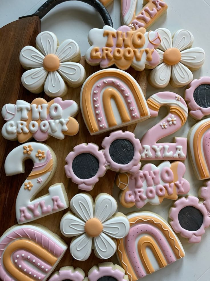 decorated cookies are arranged on a table with the numbers one - two - three and four - six