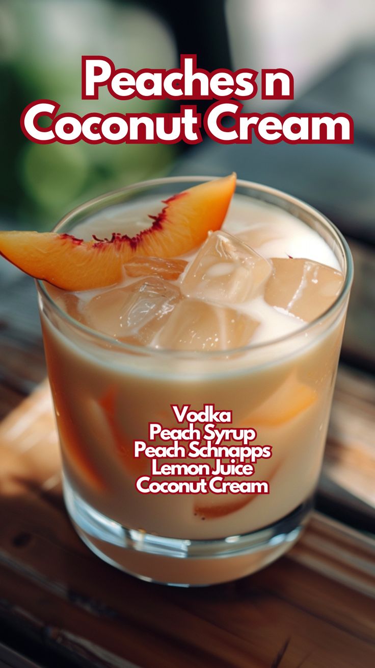 peaches n coconut cream in a glass with ice and garnish on the rim