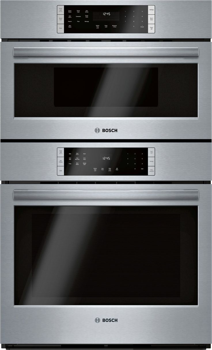 two stainless steel ovens side by side