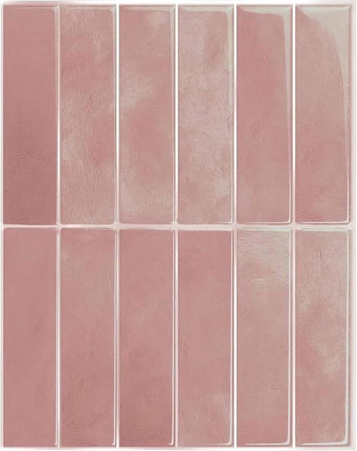 a pink tile wall with different shades