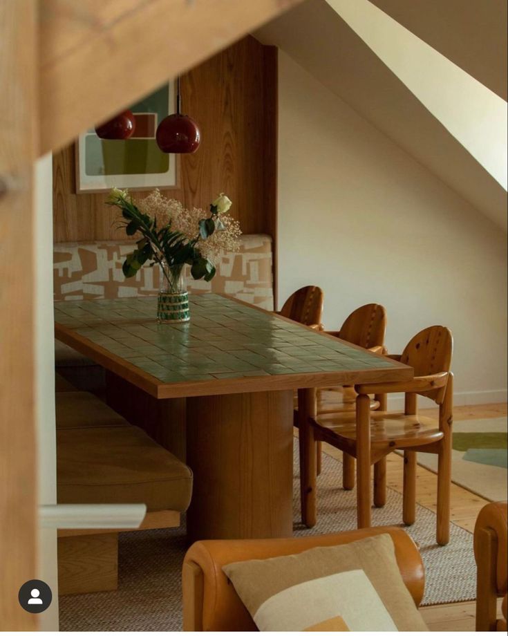 an image of a table and chairs in a room