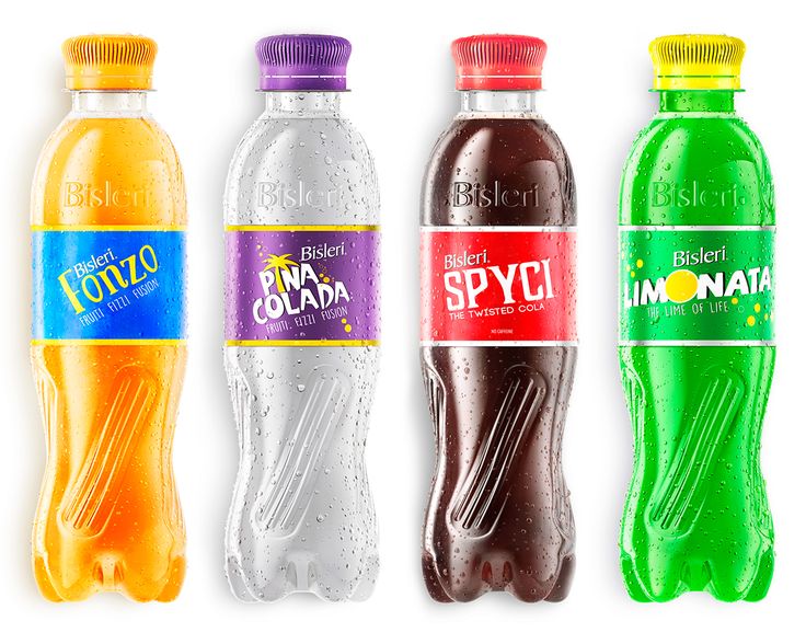 three different types of sodas are lined up in a row on a white background