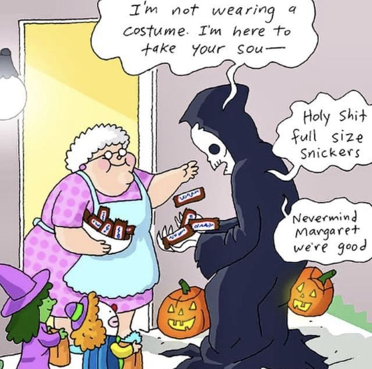 an older woman is handing out halloween treats to her cat