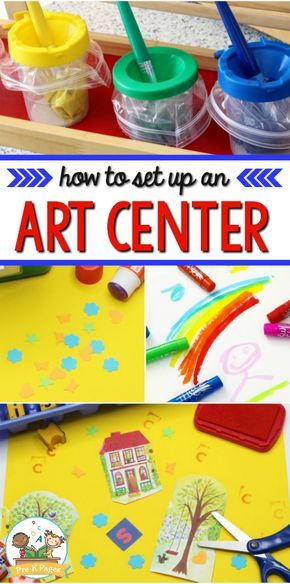 an art center with colorful paints and paper on the table, and pictures of children's artwork