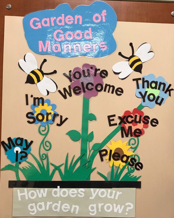 a bulletin board with flowers and bees on it