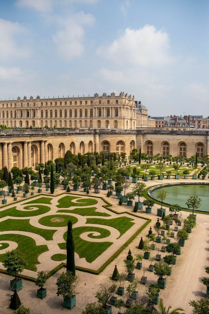 an aerial view of the gardens and palace